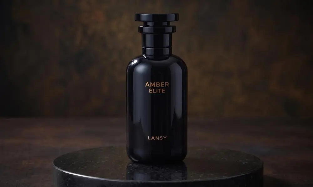 A sleek, glossy black perfume bottle labeled "AMBER ÉLITE by LANSY"