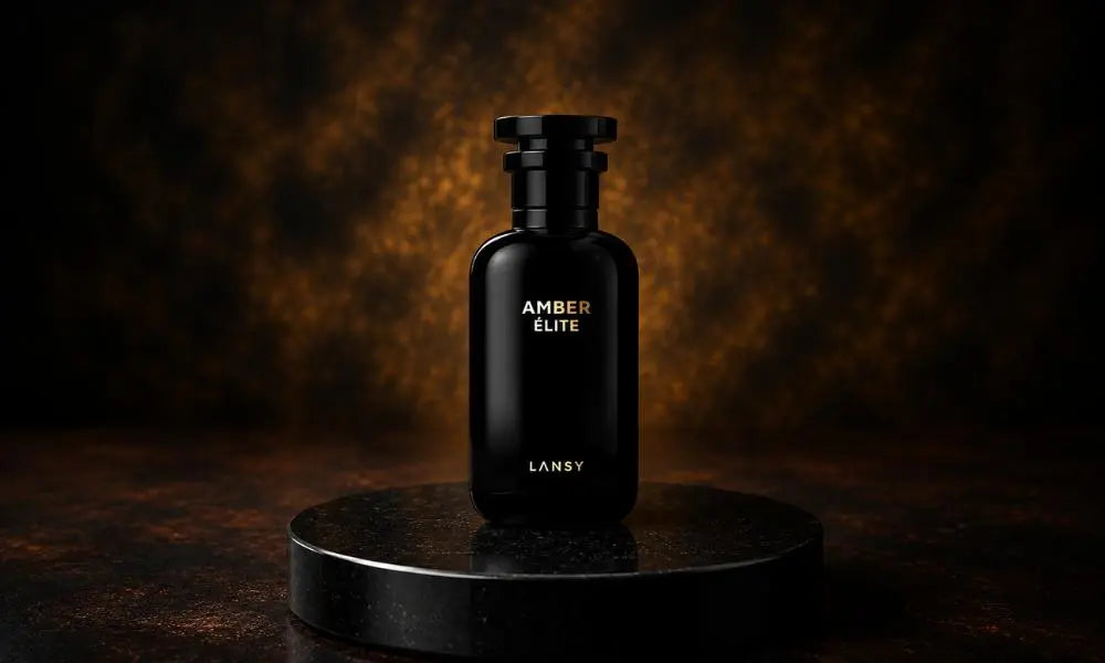A sleek, glossy black perfume bottle labeled "AMBER ÉLITE by LANSY"