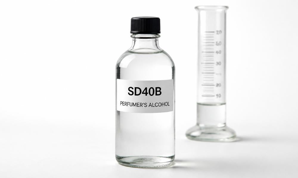 Bottle of SD40B perfumer’s alcohol with a graduated cylinder.