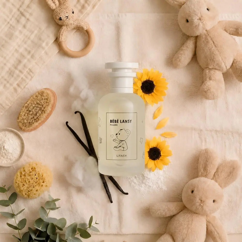 BèBè Lansy baby scent with teddy bears, sunflowers and vanilla beans on beige fabric.