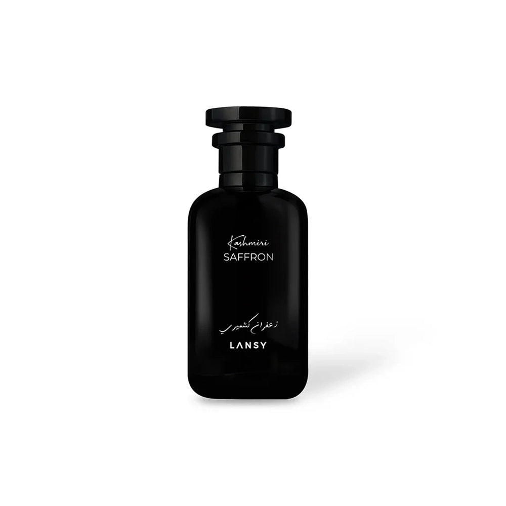 Black perfume bottle labeled &