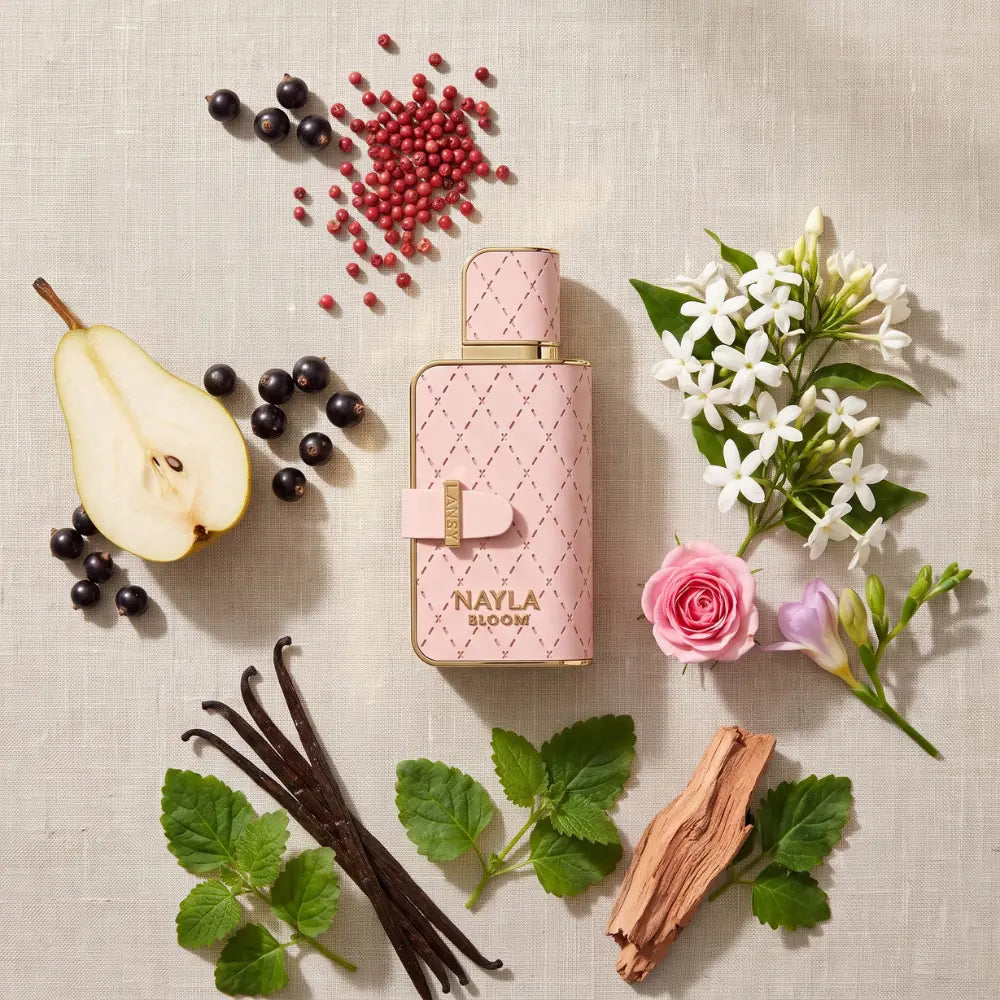 LANSY Nayla Bloom pink perfume bottle with natural ingredients and flowers