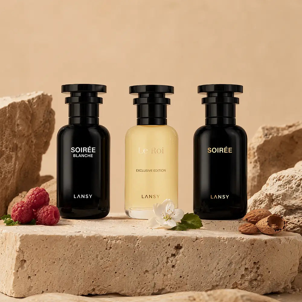 LANSY Soirée Blanche and Le Roi perfume bottles with raspberries, white flower and almonds.