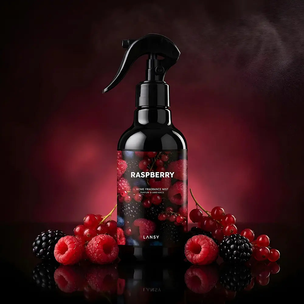 Raspberry mist with raspberries and berries on a dark background.