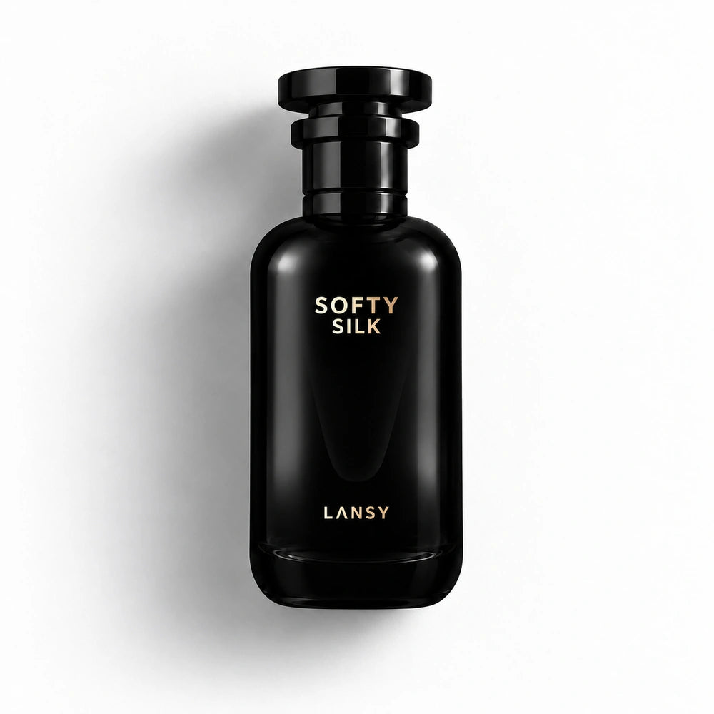 Black perfume bottle labeled &