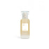 Skincare bottle with a gradient design on a white background