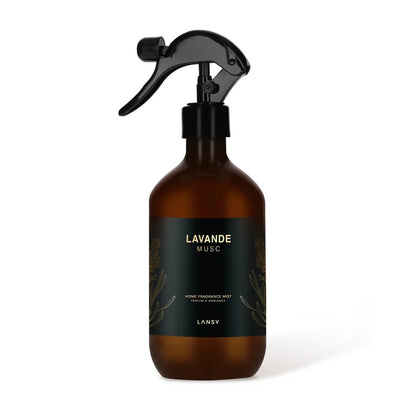 Brown spray bottle with black label on a white background