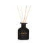Black LANSY diffuser bottle with wooden sticks on a white background