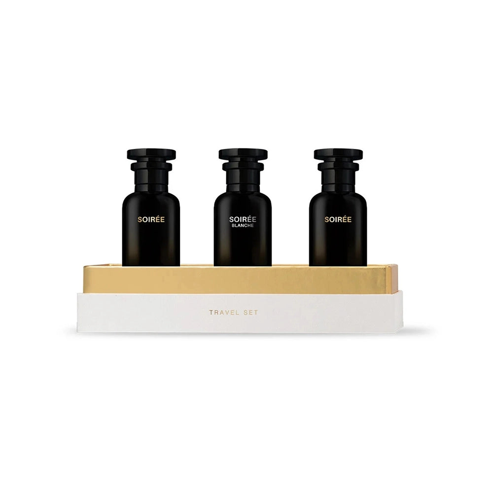 Set of three black bottles with gold base on a white background