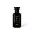 Black perfume bottle labeled &