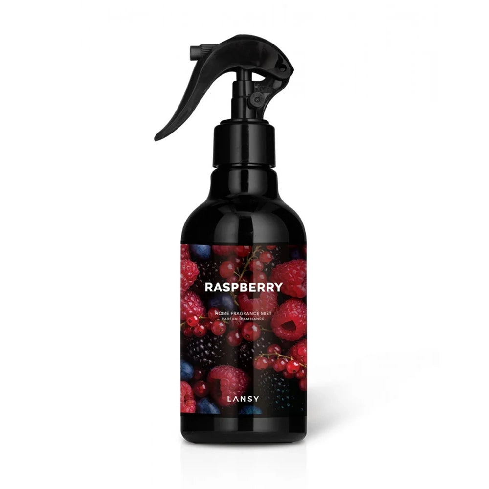 Black spray bottle with raspberry design on label against white background