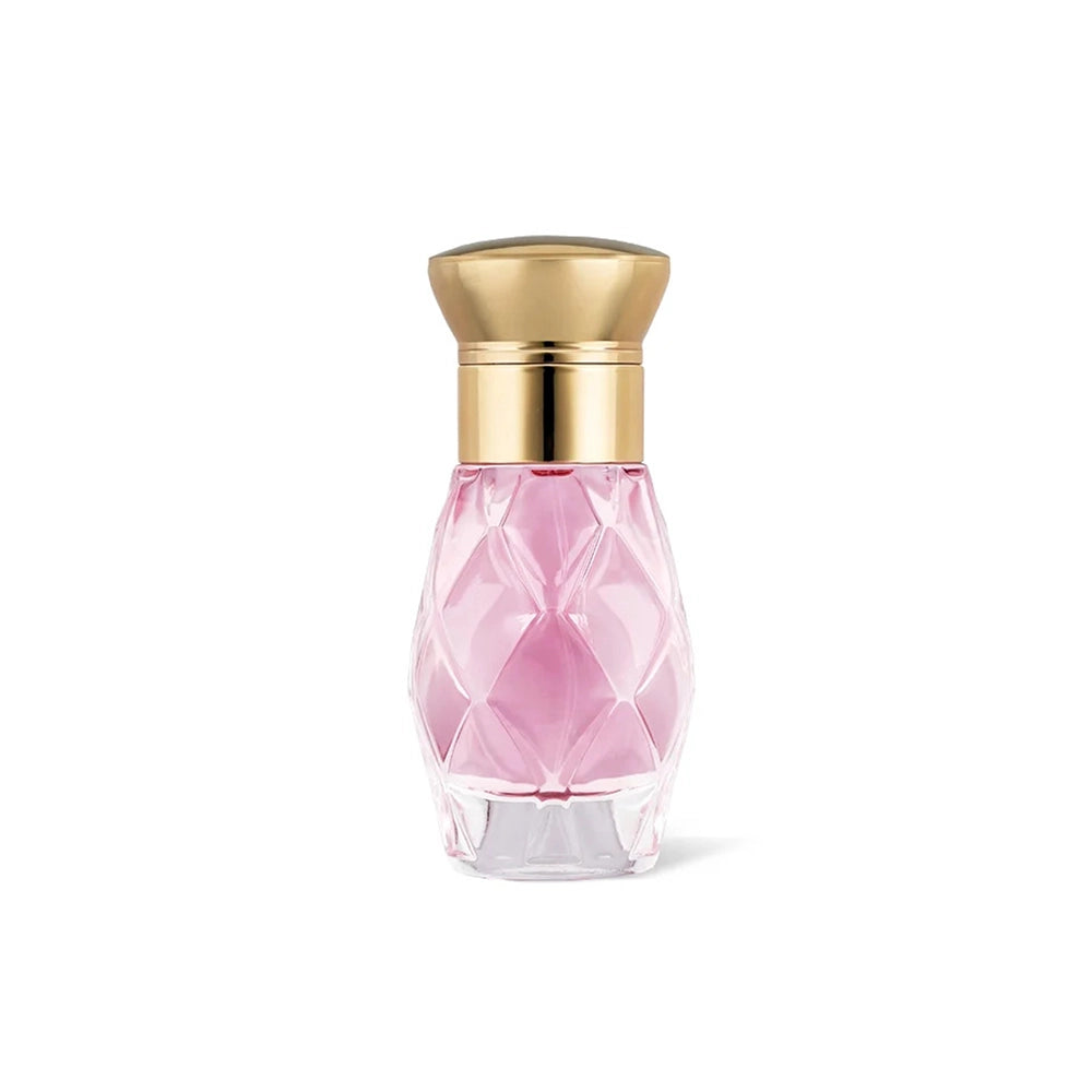 Pink perfume bottle with gold cap on a white background