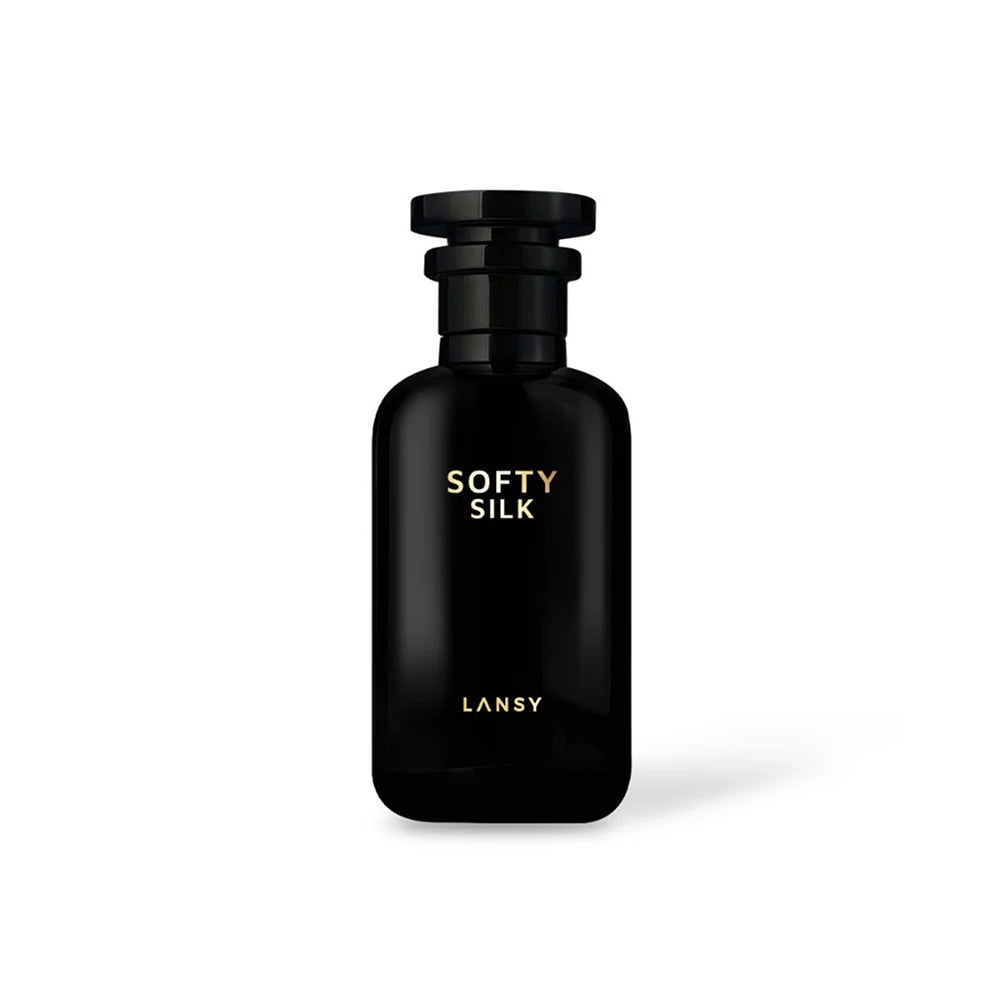 Black perfume bottle labeled &
