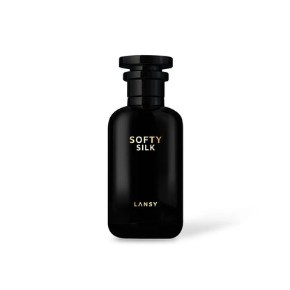 Black perfume bottle labeled &