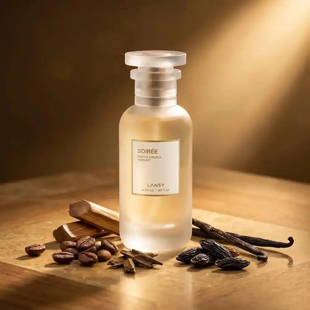 Soirée perfume with coffee, cinnamon and vanilla on a warm wooden surface.