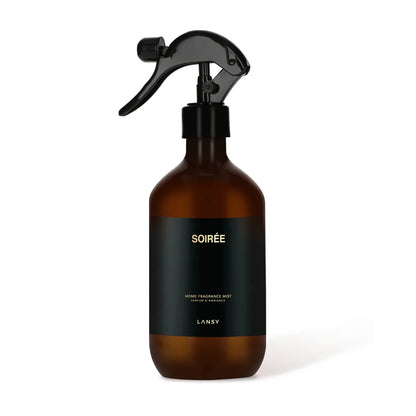 Brown spray bottle with black label on a white background