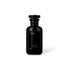 Black perfume bottle labeled &
