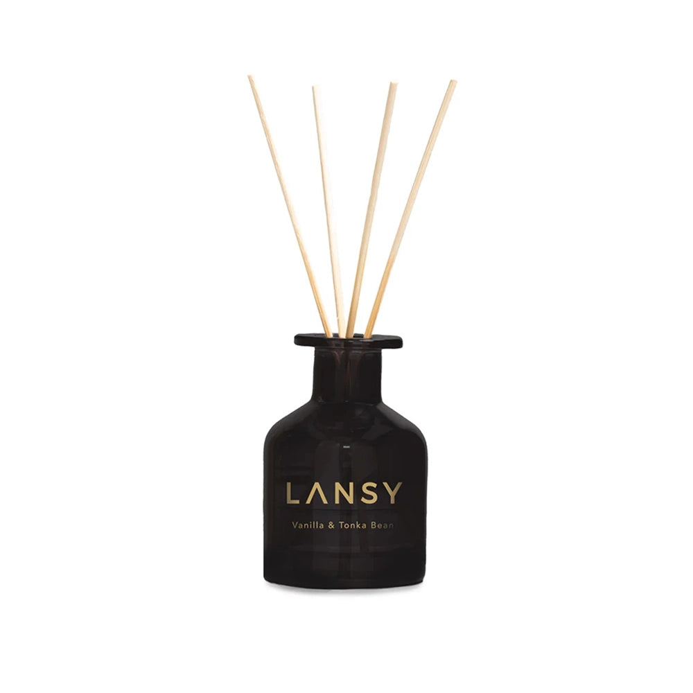 Black LANSY diffuser bottle with wooden sticks on a white background
